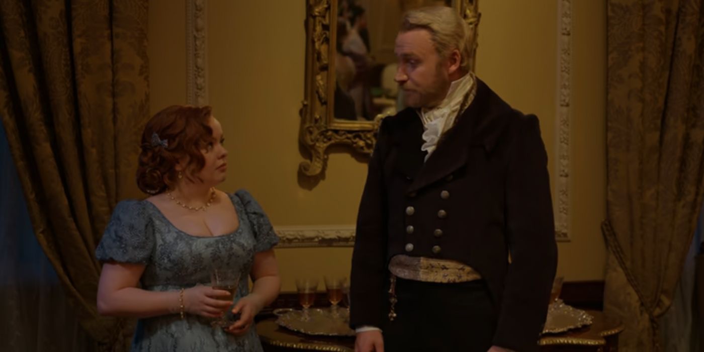 Penelope, who is holding a drink, chats with Lord Debling at a party.