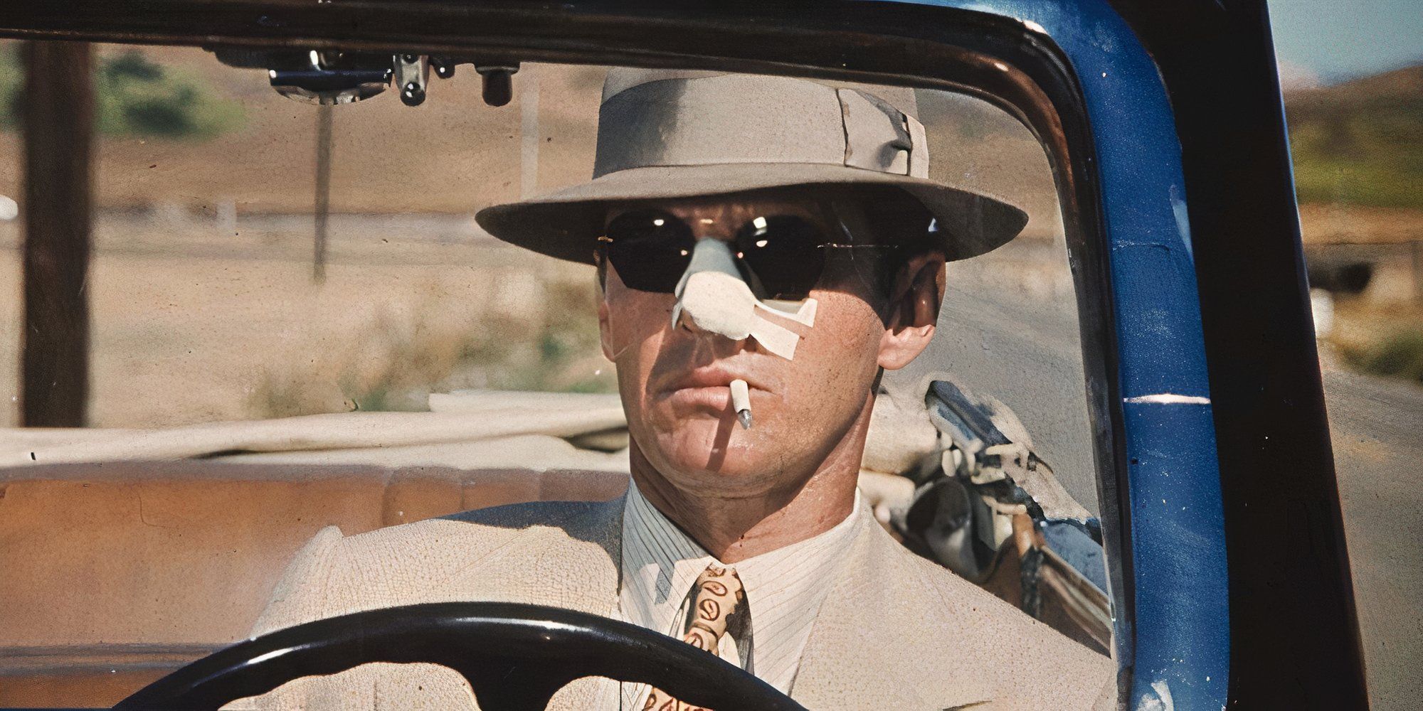 Jake Gittes (Jack Nicholson) drives around with a scarred nose in 'Chinatown.'