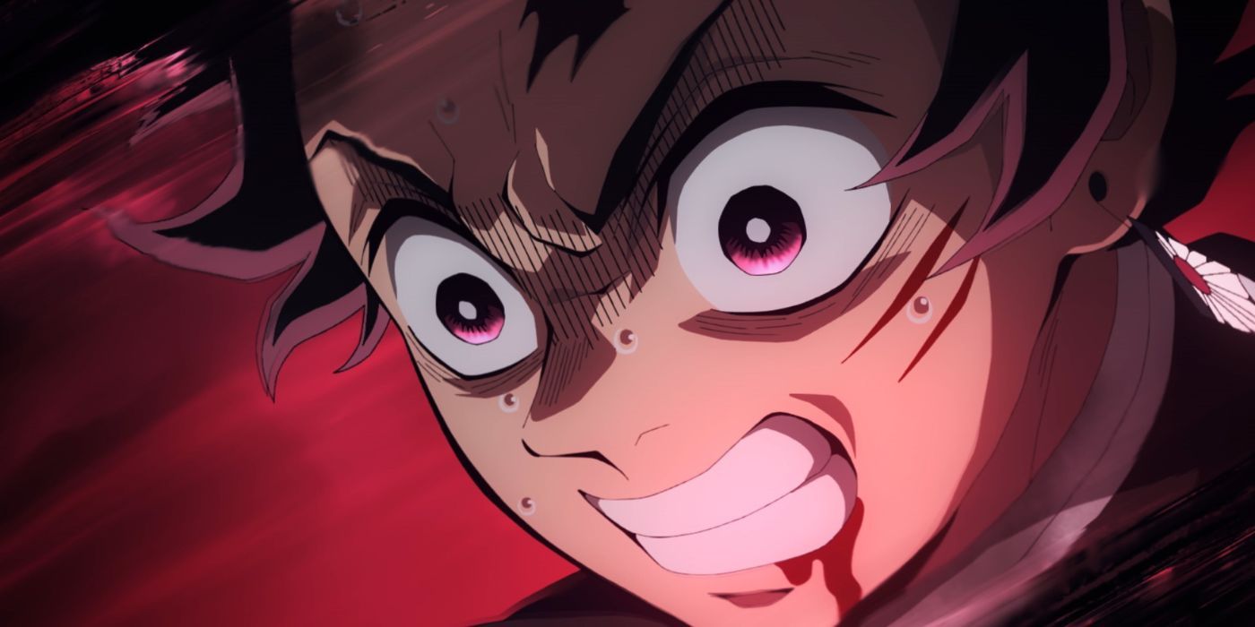 Close-up shot of an angry and injured Tanjiro in Demon Slayer