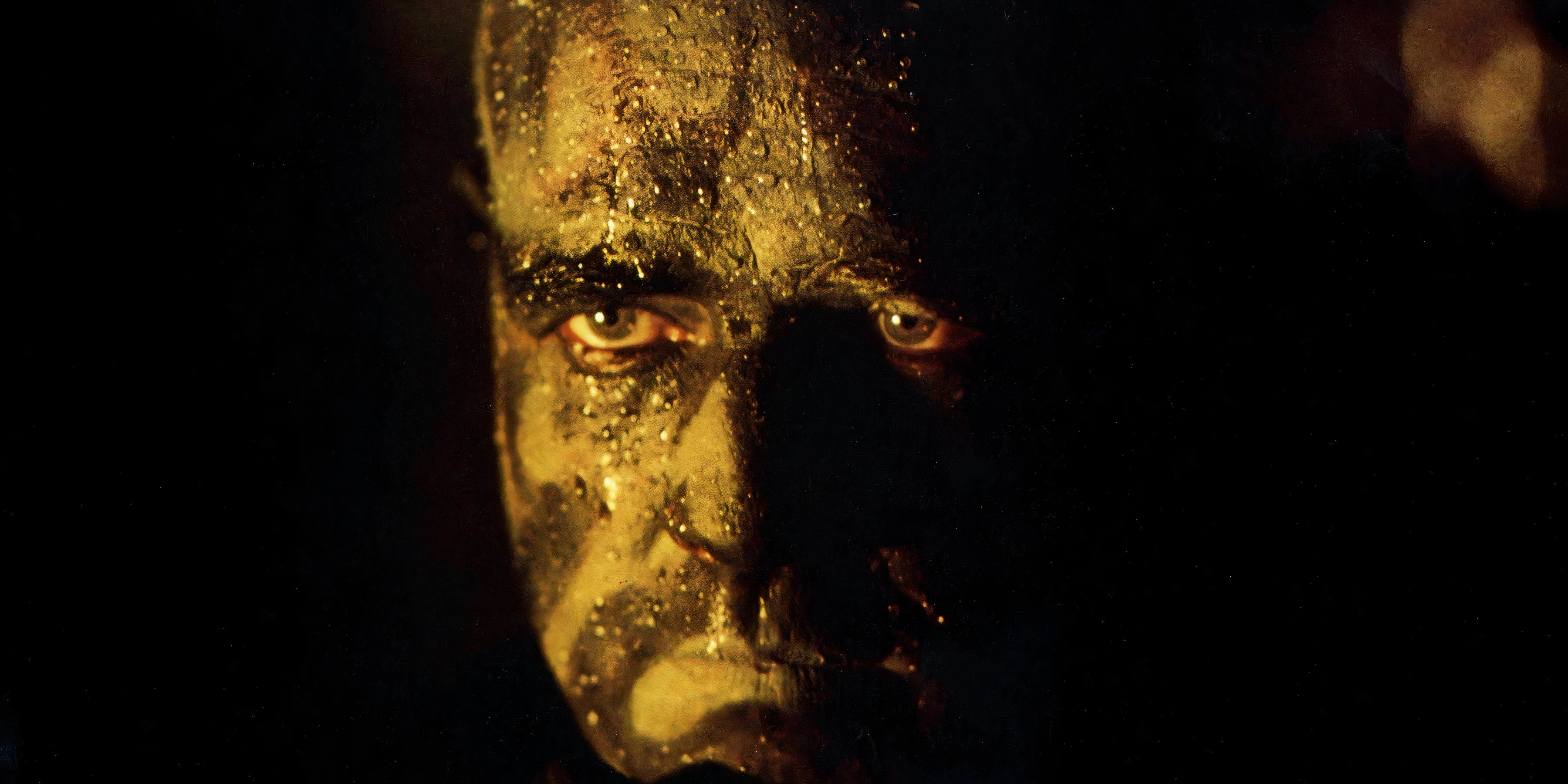 A close-up of Colonel Kurtz with painting on his face in Apocalypse Now