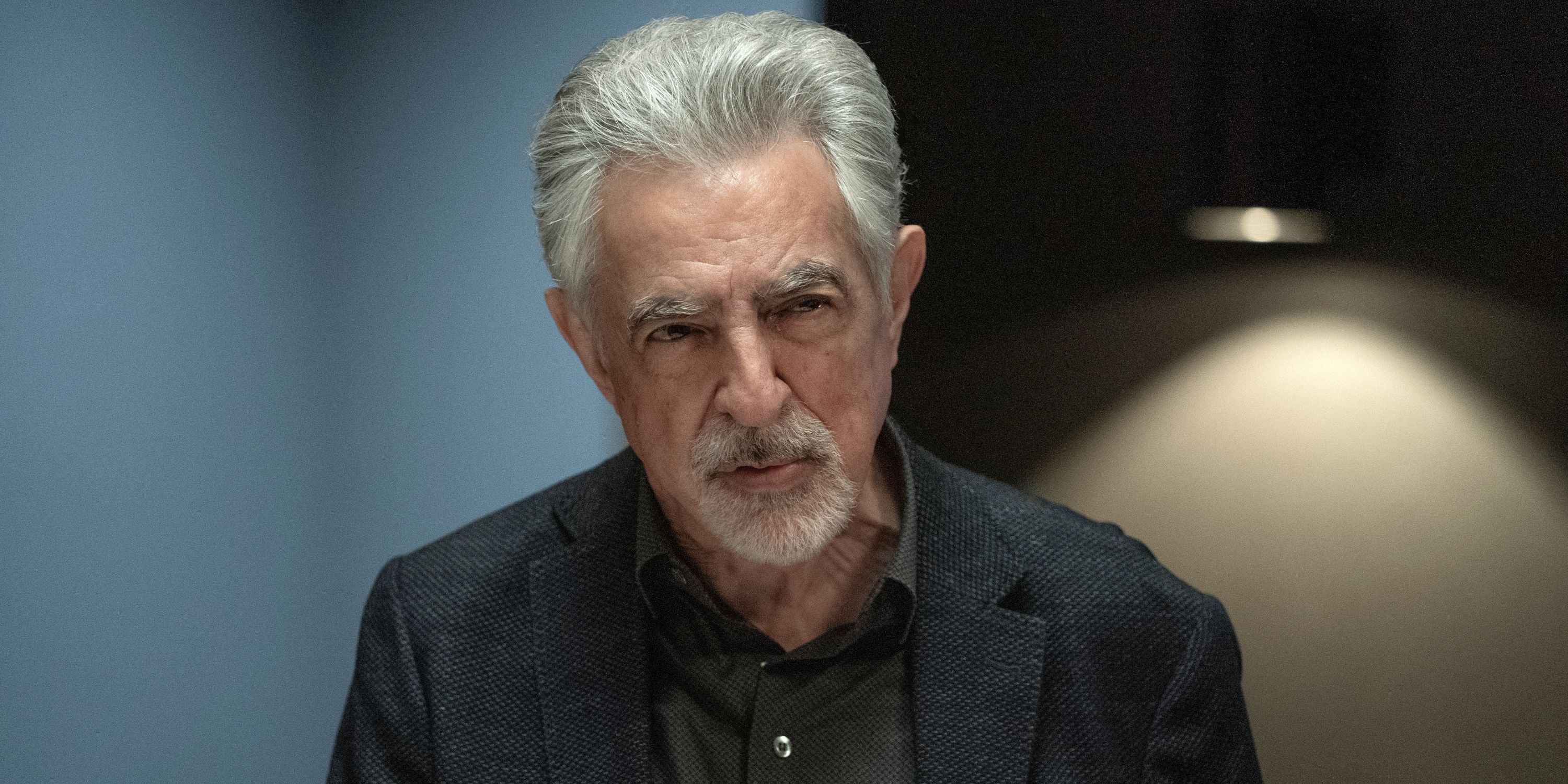Joe Mantegna as David Rossi staring with a serious expression in Season 17 of Criminal Minds: Evolution