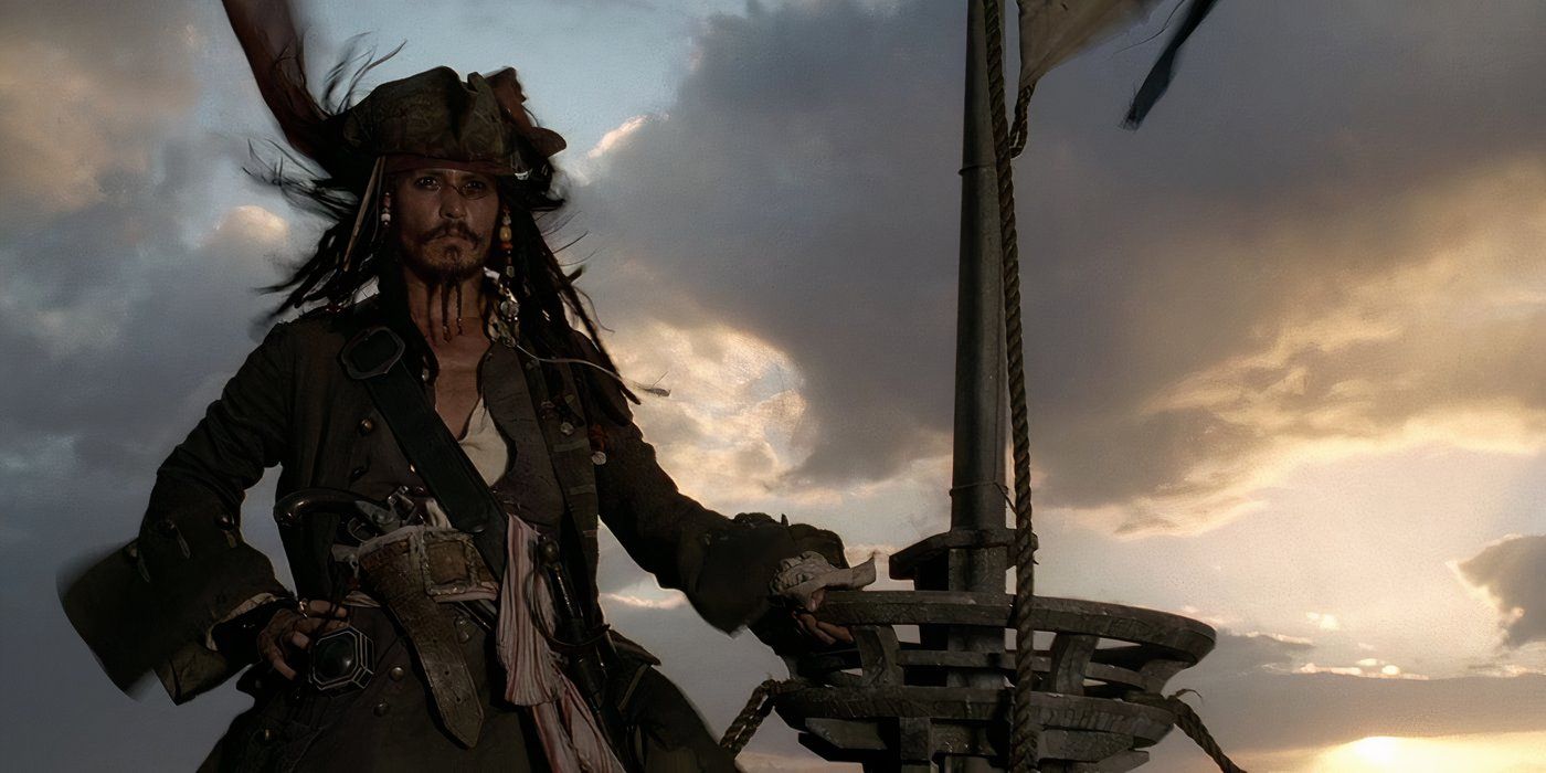 Captain Jack Sparrow (Johnny Depp) stands in the crow's nest of a ship, looking triumphantly out over the horizon