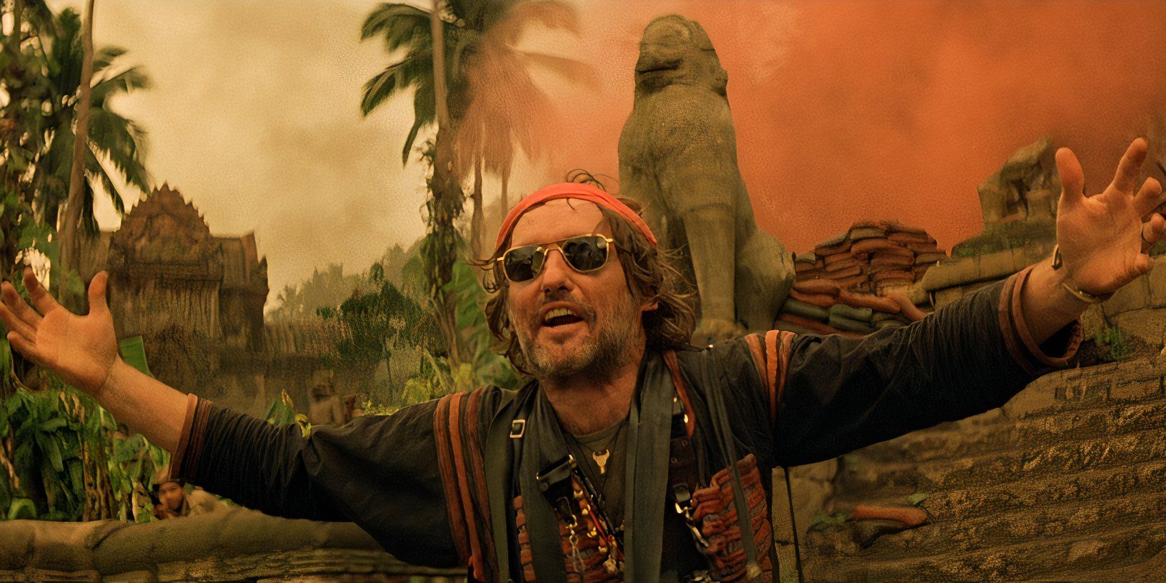 The photojournalist spreading his arms in Apocalypse Now