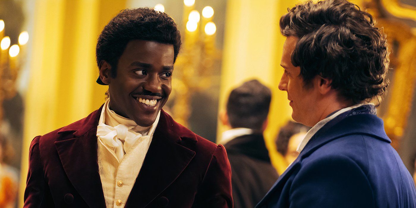 Ncuti Gatwa smiling at Jonathan Groff in regency costumes in Doctor Who