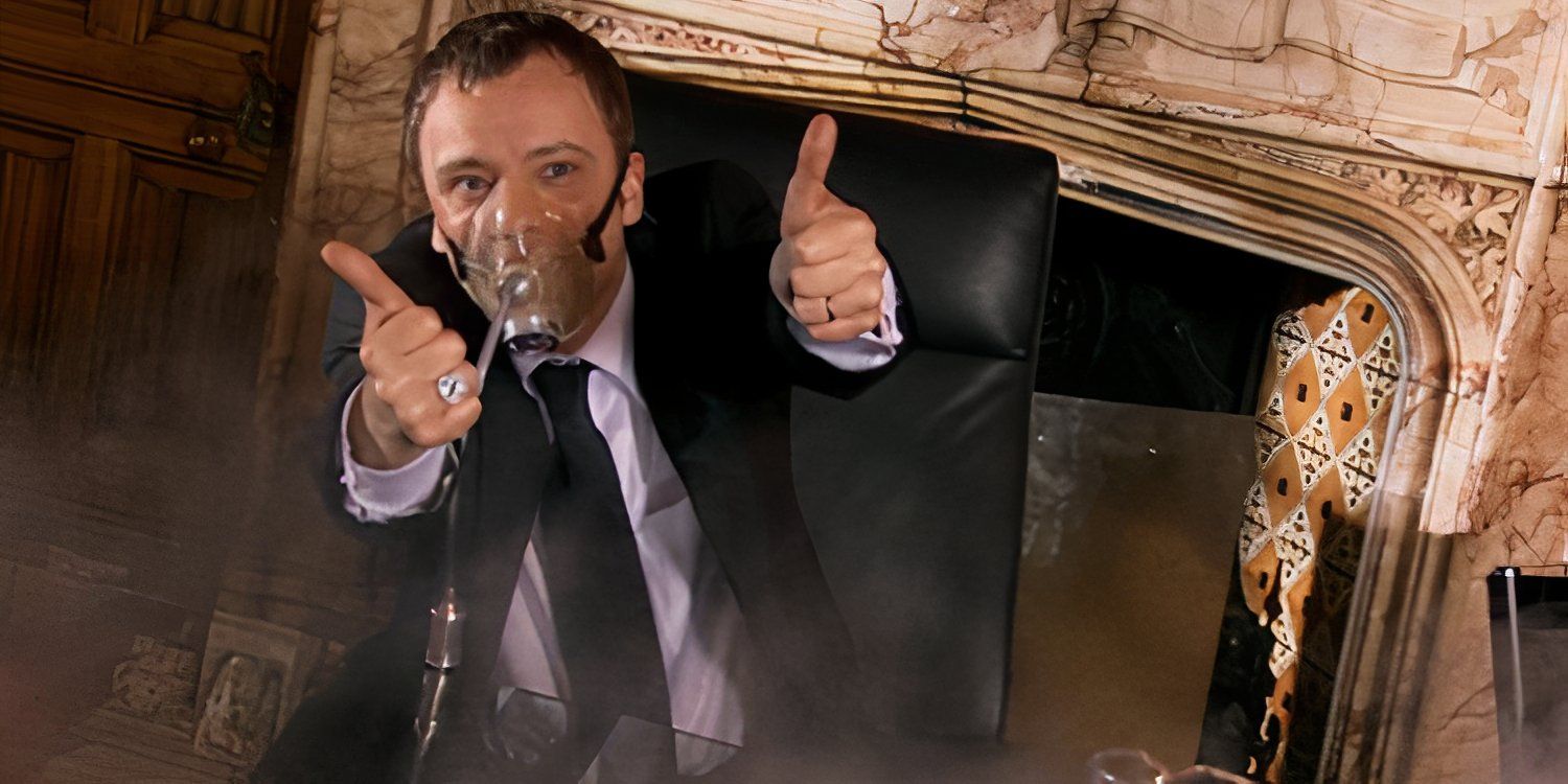 John Simm as The Master wearing gas mask and putting his thumbs up in Doctor Who