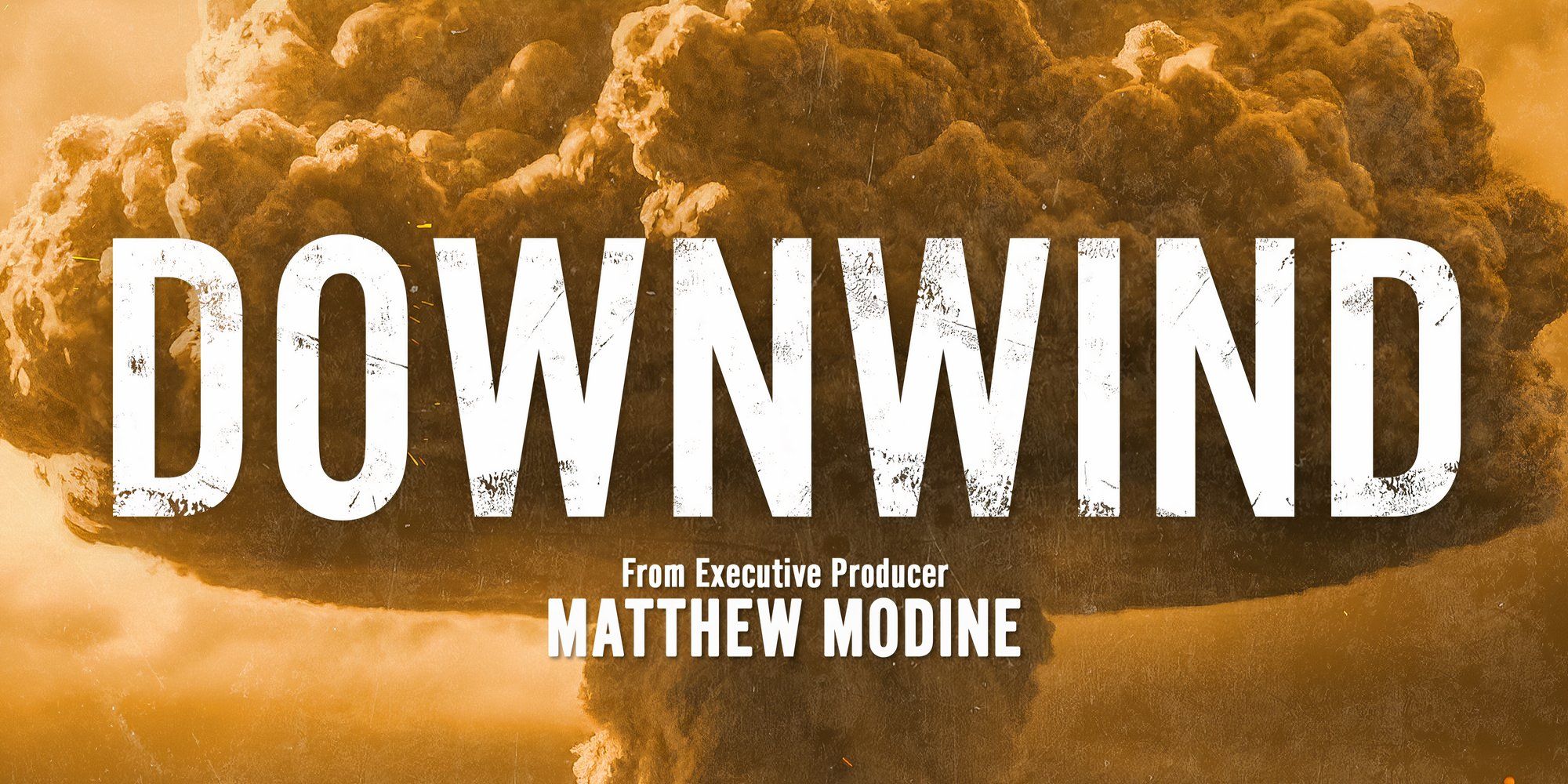 The title card for the documentary Downwind showing a mushroom cloud.