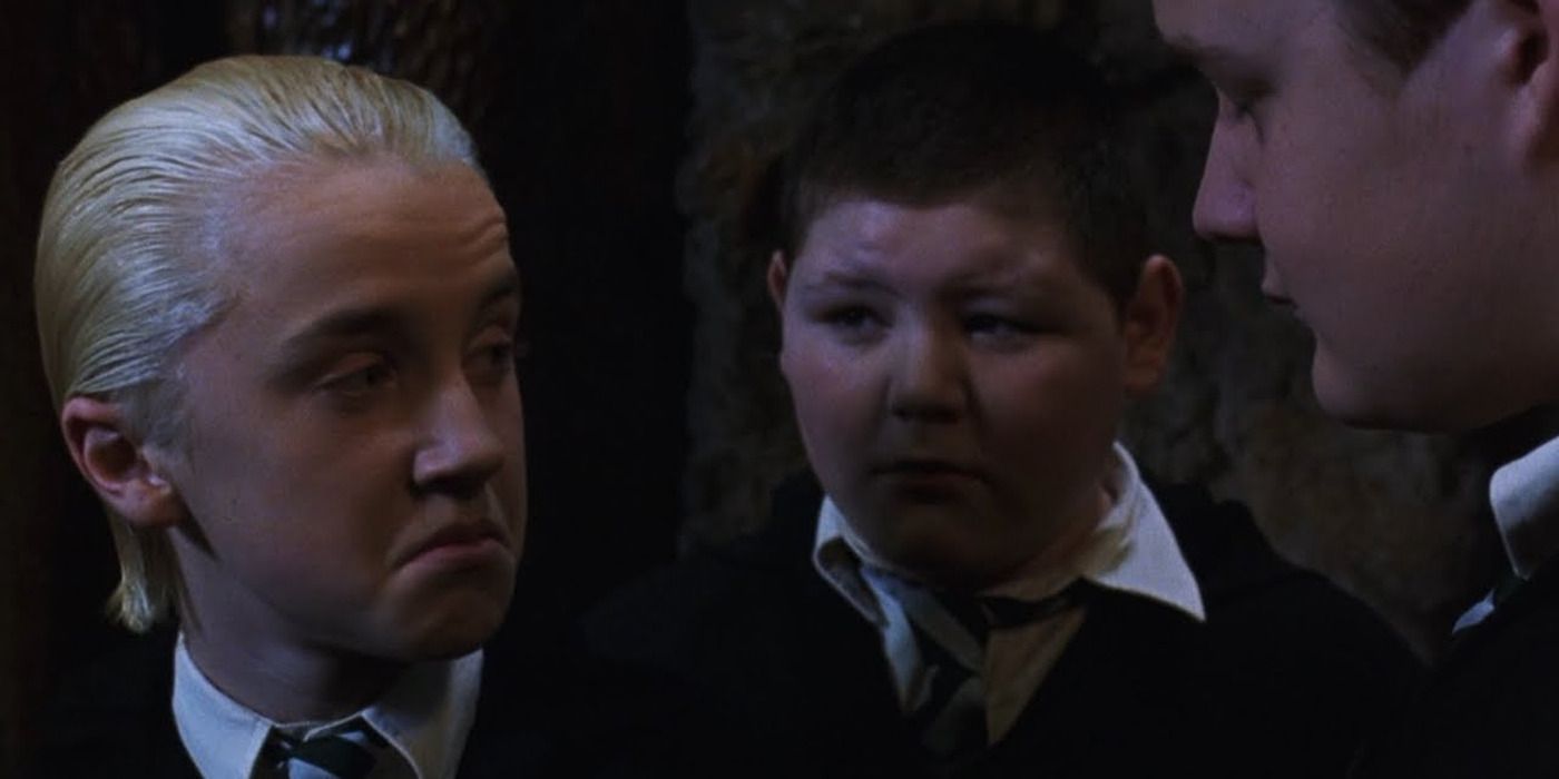 Draco talking to Crabbe and Goyle in 'Harry Potter and the Chamber of Secrets'