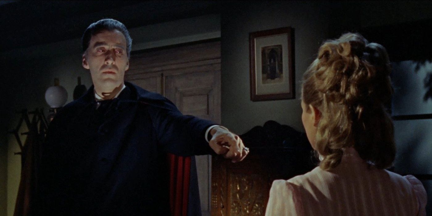 Dracula pointing at a woman in Dracula: Prince of Darkness