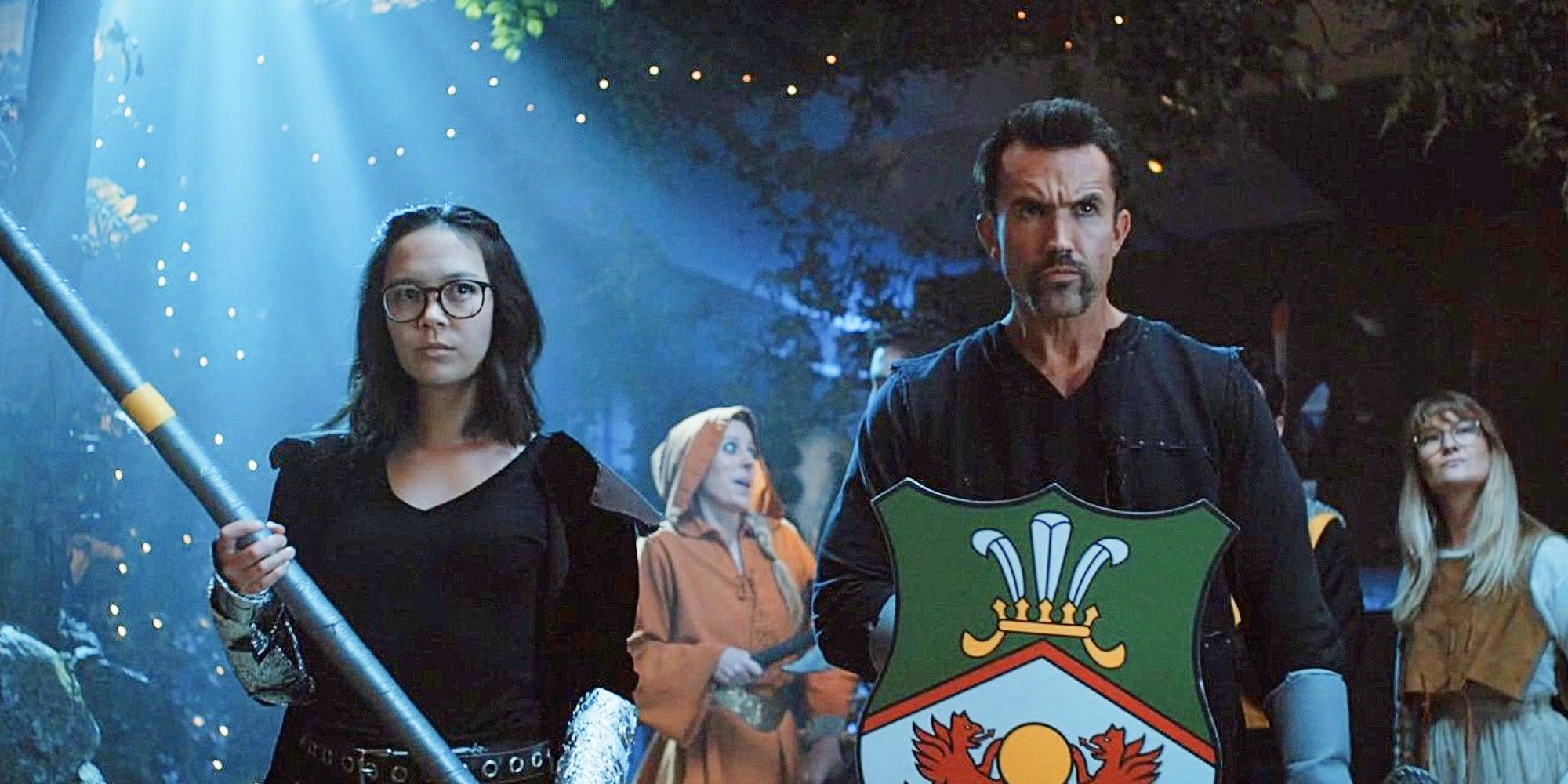 Poppy Li and Ian Grimm holding swords and shields in Mythic Quest &lsquo;Everlight&rsquo;.
