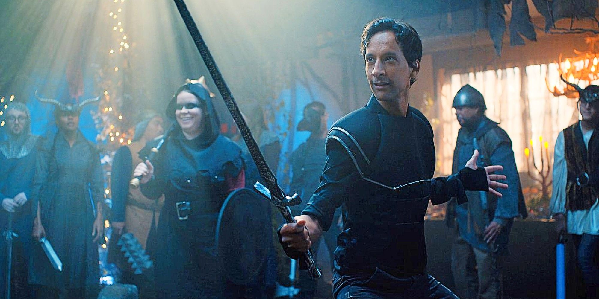 Brad Bakshi and Jo hold weapons, ready for action, in Mythic Quest episode &ldquo;Everlight&rdquo;.