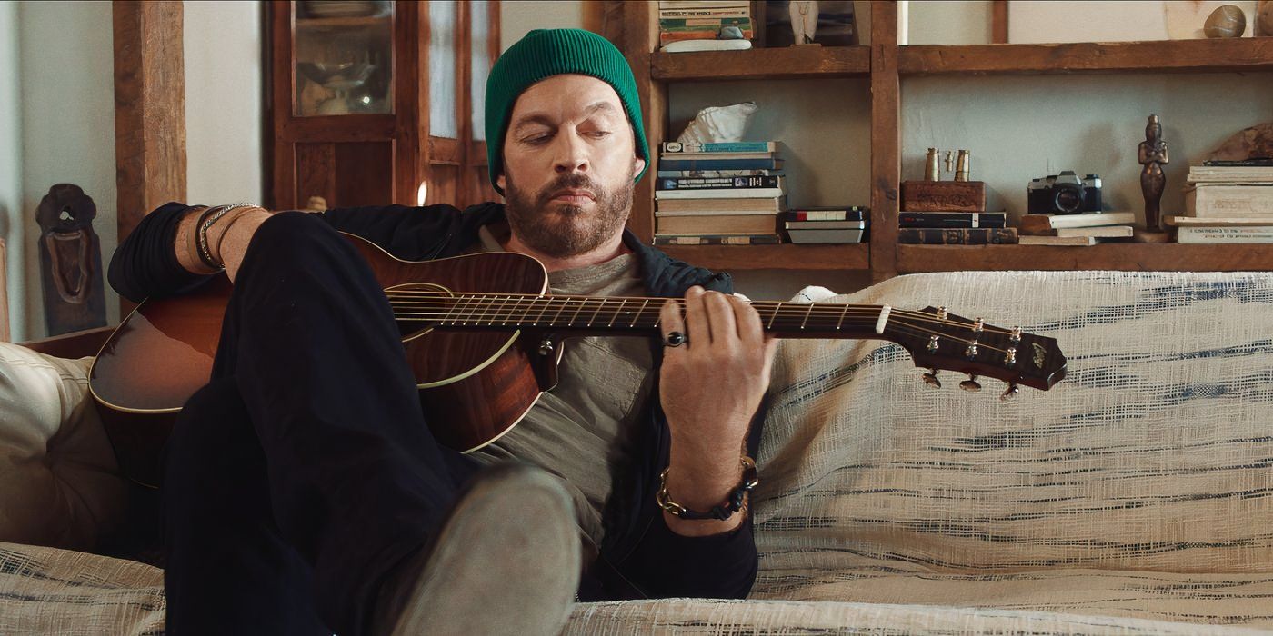 Harry Connick Jr. toca la guitarra en 