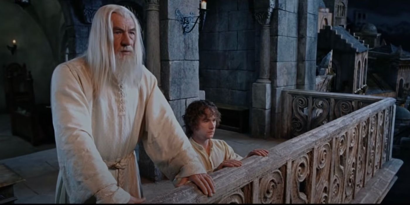 Gandalf the White (Ian McKellen) stands alongside Pippin (Billy Boyd) on a balcony in Gondor as the gaze over at Mordor in 'The Lord of the Rings: The Return of the King' (2003).