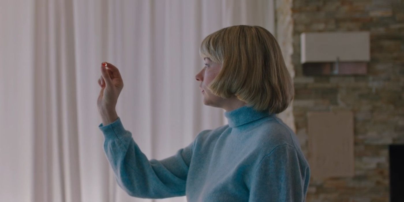 Haley Bennett as Hunter holds up a marble in Swallow
