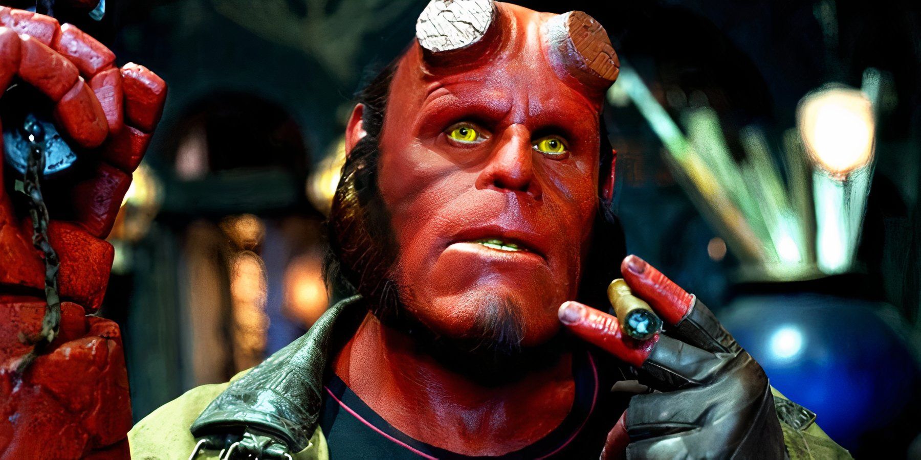 Hellboy smokes a cigar, his yellow eyes narrowed in Hellboy.