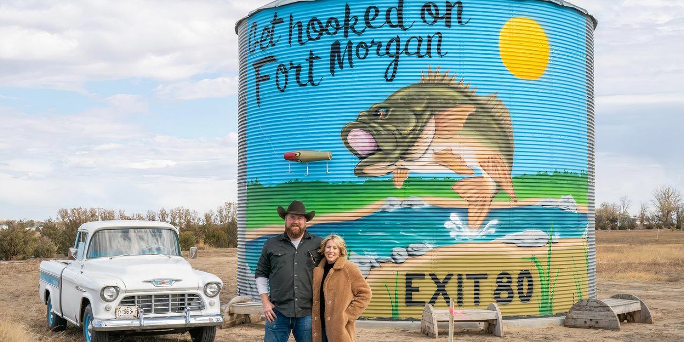 The water tower in Fort Morgan with Ben and Erin Napier posing during &lsquo;Home Town Takeover.'