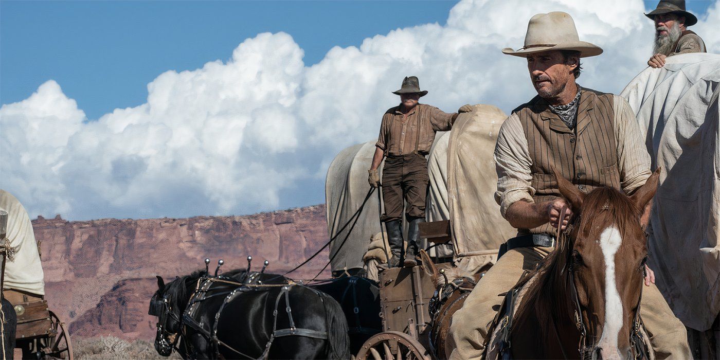 Luke Wilson as Van Weydan riding on a horse next to a wagon train in Horizon: An American Saga