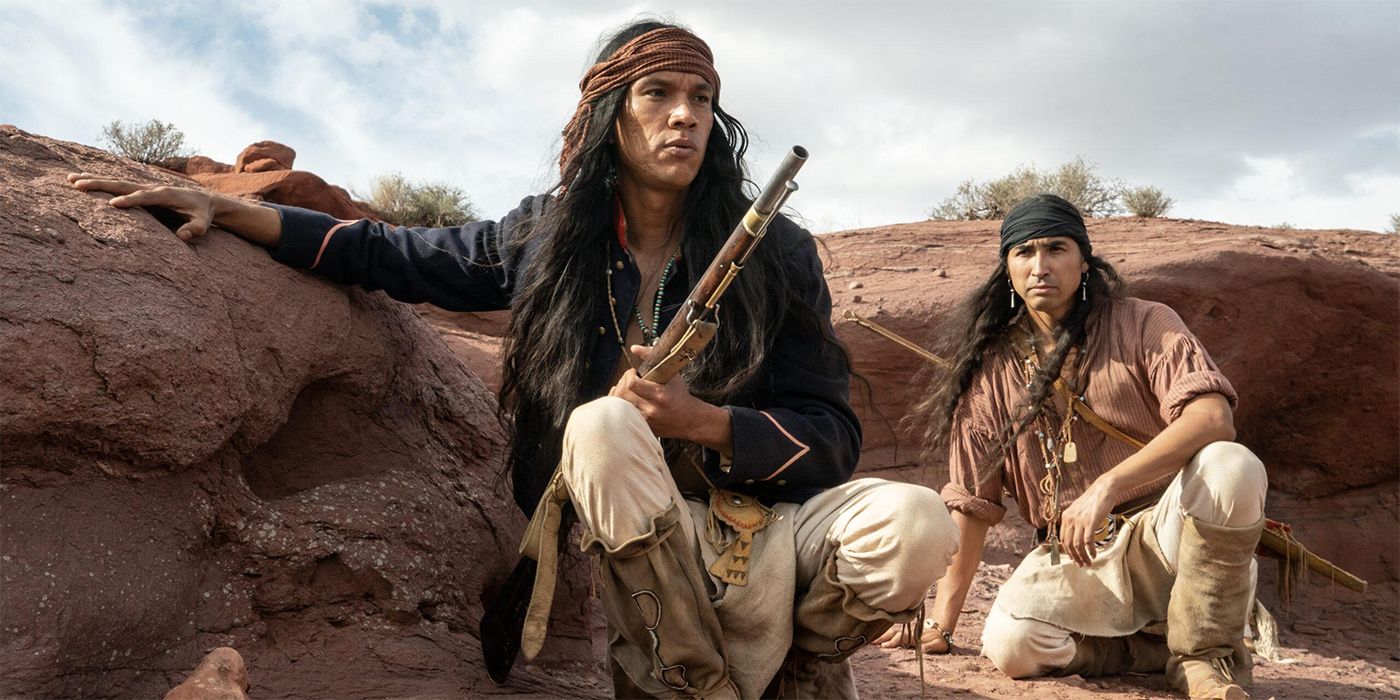 Owen Crow Shoe as Pionsenay holding a gun and standing next to Tatanka Means as Taklishim in Horizon: An American Saga