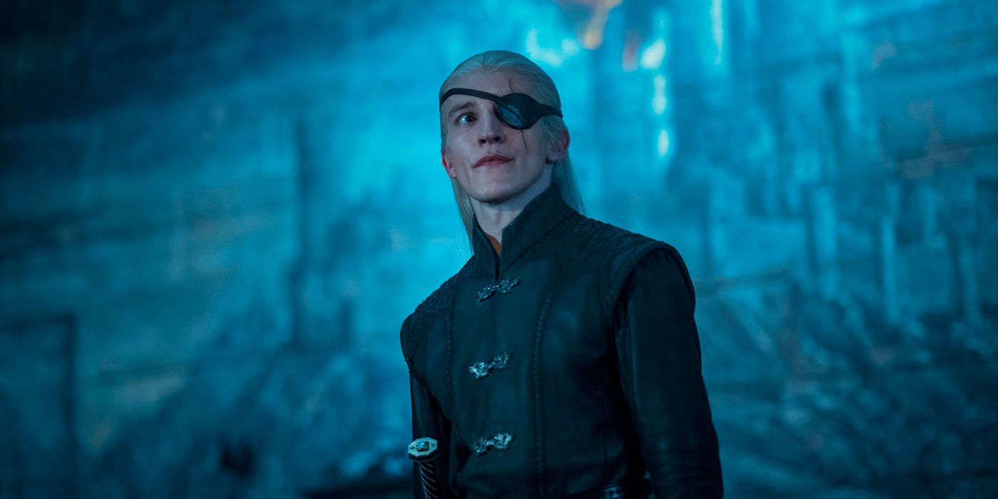 Ewan Mitchell as Aemond Targaryen looking up dubiously in House of the Dragon Season 2