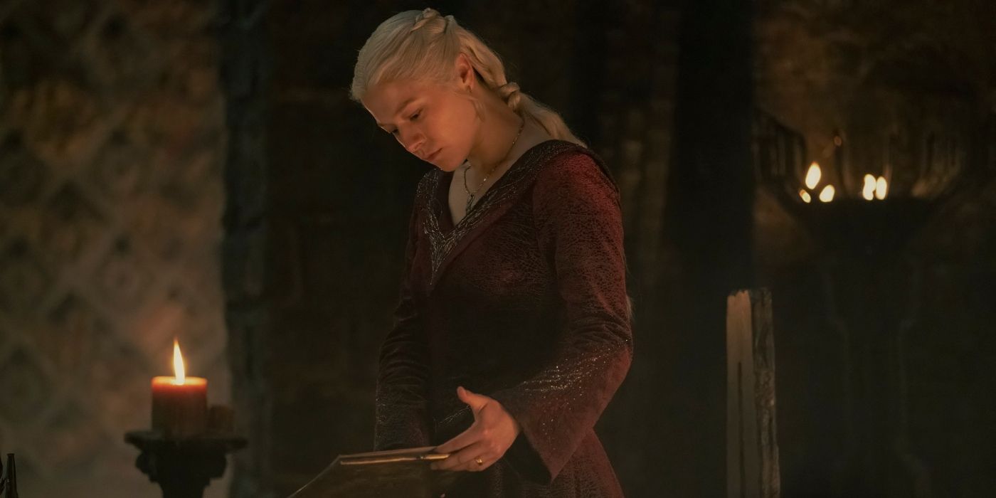 Emma D'Arcy flipping through a book in House of the Dragon Season 2 Episode 2