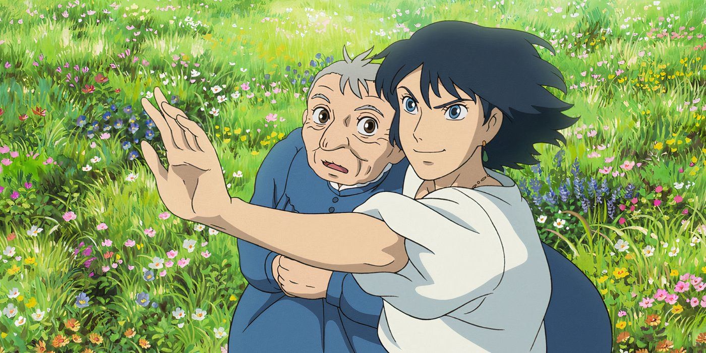 A young man pointing ahead while an old woman stands beside him in Howls Moving Castle