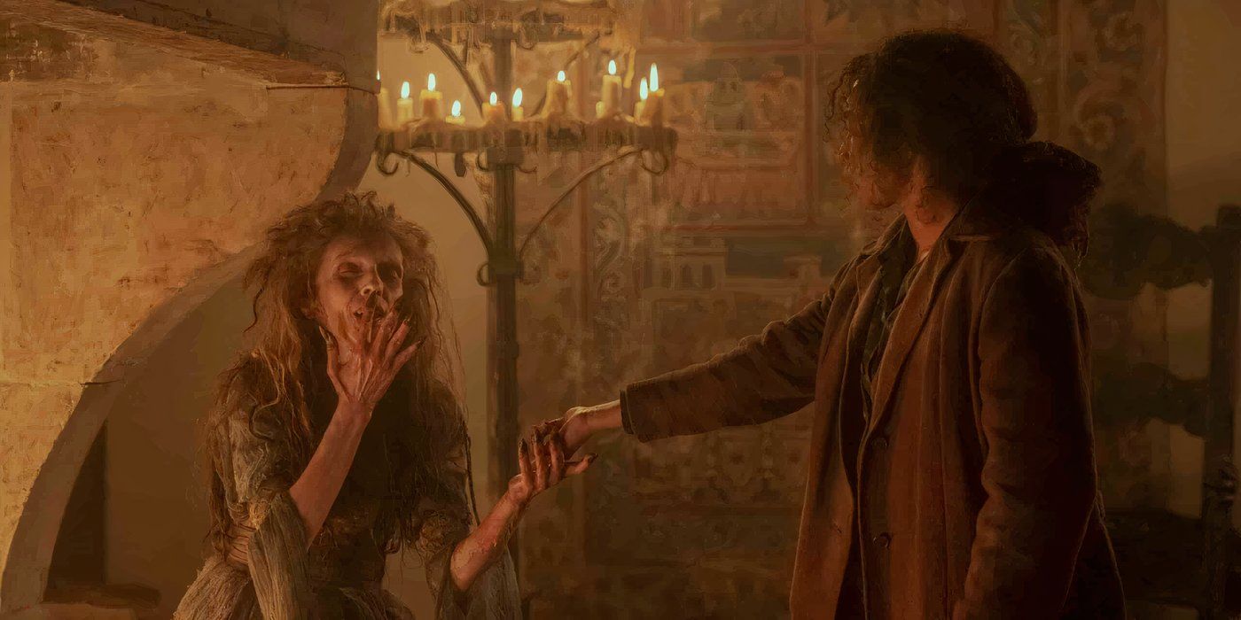 Claudia (Delainey Hayles) holds Daciana's (Diana Gheorghian) hand in her cobweb-covered apartment in Interview with a Vampire
