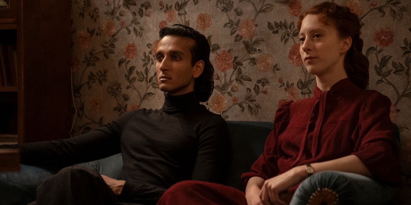 Roxane Duran and Assad Zaman sitting side-by-side on a sofa in Interview with the Vampire Season 2