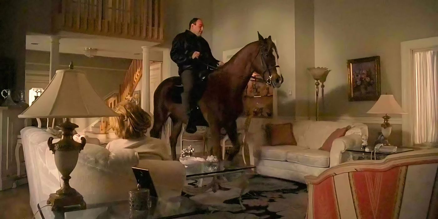 James Gandolfini sits atop his racehorse Pie O My in his living room as Edie Falco observes from the sofa from the episode Test Dream in The Sopranos