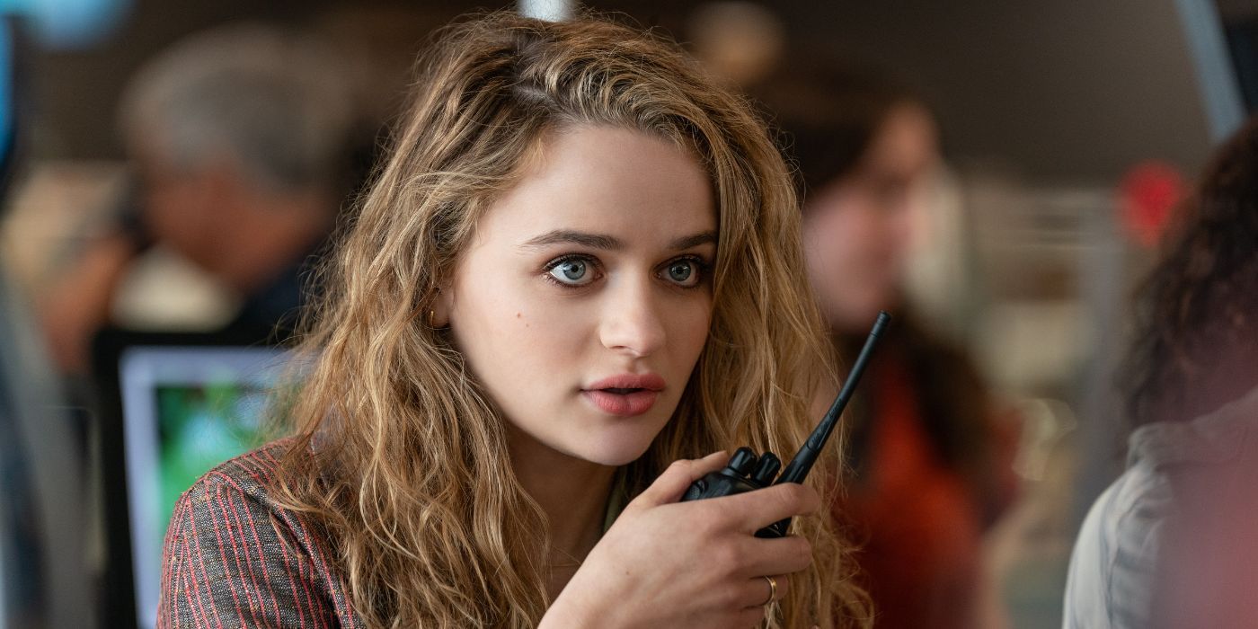 Joey King as Zara Ford talking into a walkie talkie in A Family Affair.