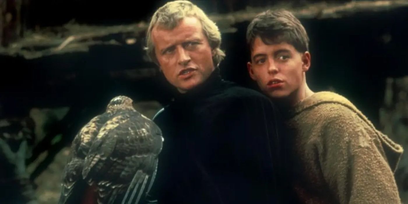 Etienne of Navarre and The Mouse on horseback looking back at something in Ladyhawke