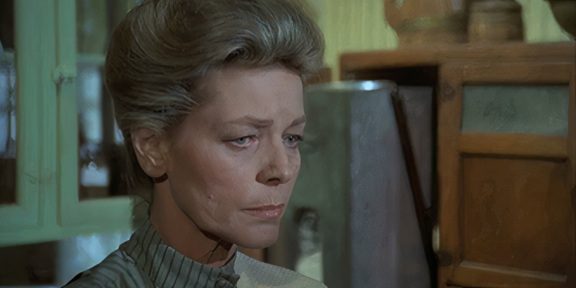 Lauren Bacall in The Shootist looking worried.