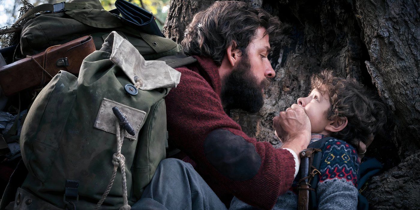 Lee (John Krasinski) keeps Marcus (Noah Jupe) quiet in 'A Quiet Place'