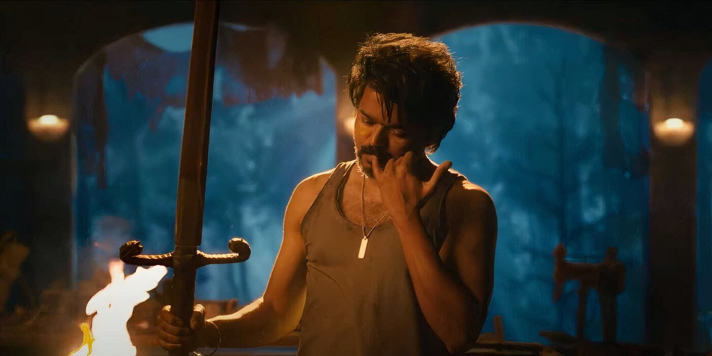 Vijay as Parthiban holding up a sword and putting his pinky finger in his mouth in &lsquo;Leo&rsquo; (2023)