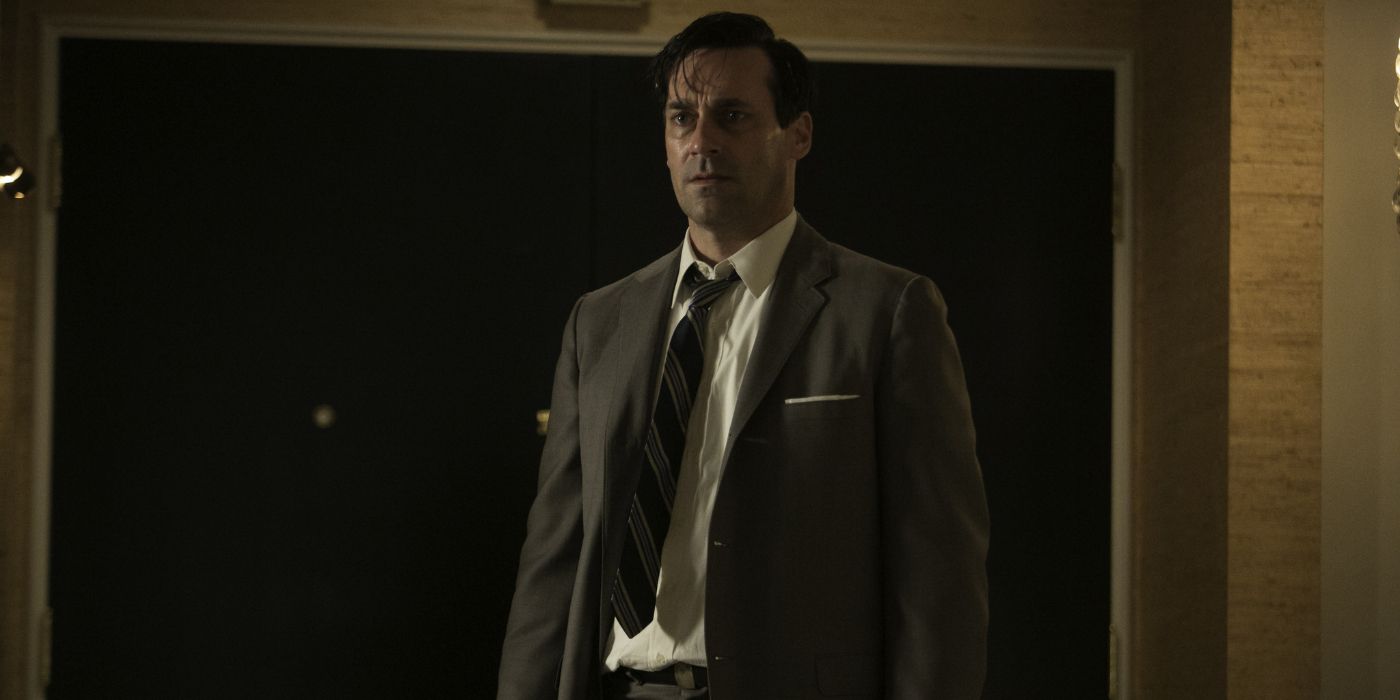 A sweaty and drug-ailed Don Draper (Jon Hamm) stands in the doorway of his apartment in 'Mad Men' Season 6, Episode 8 "The Crash" (2013).