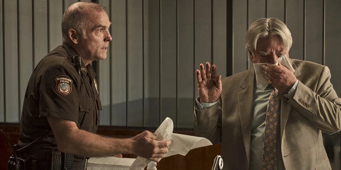 Mayor Teale covering his bloody nose in Reacher season 1, episode 5