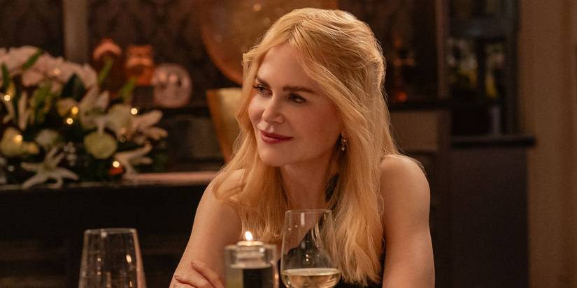 Nicole Kidman as Brooke Harwood, smiling at a restaurant, in A Family Affair.