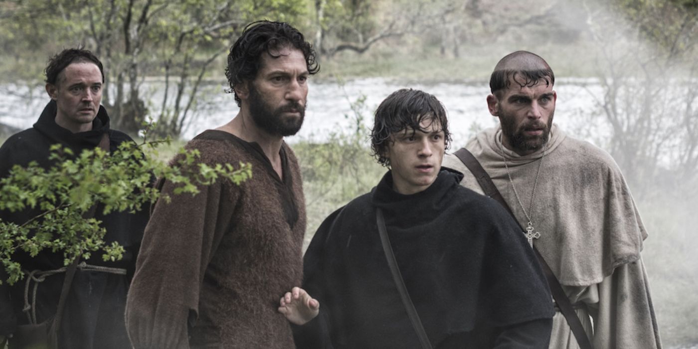 The Mute and The Novice with other men looking to the distance in &lsquo;Pilgrimage&rsquo; (2017)