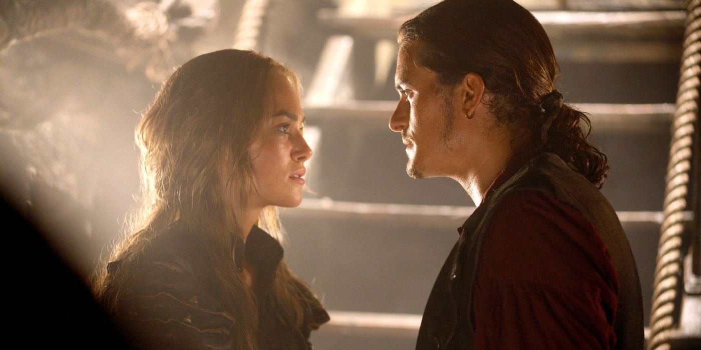 Elizabeth Swann and Will Turner speak with each other beneath the hull of a ship in 'Pirates of the Caribbean: At World's End' (2007).