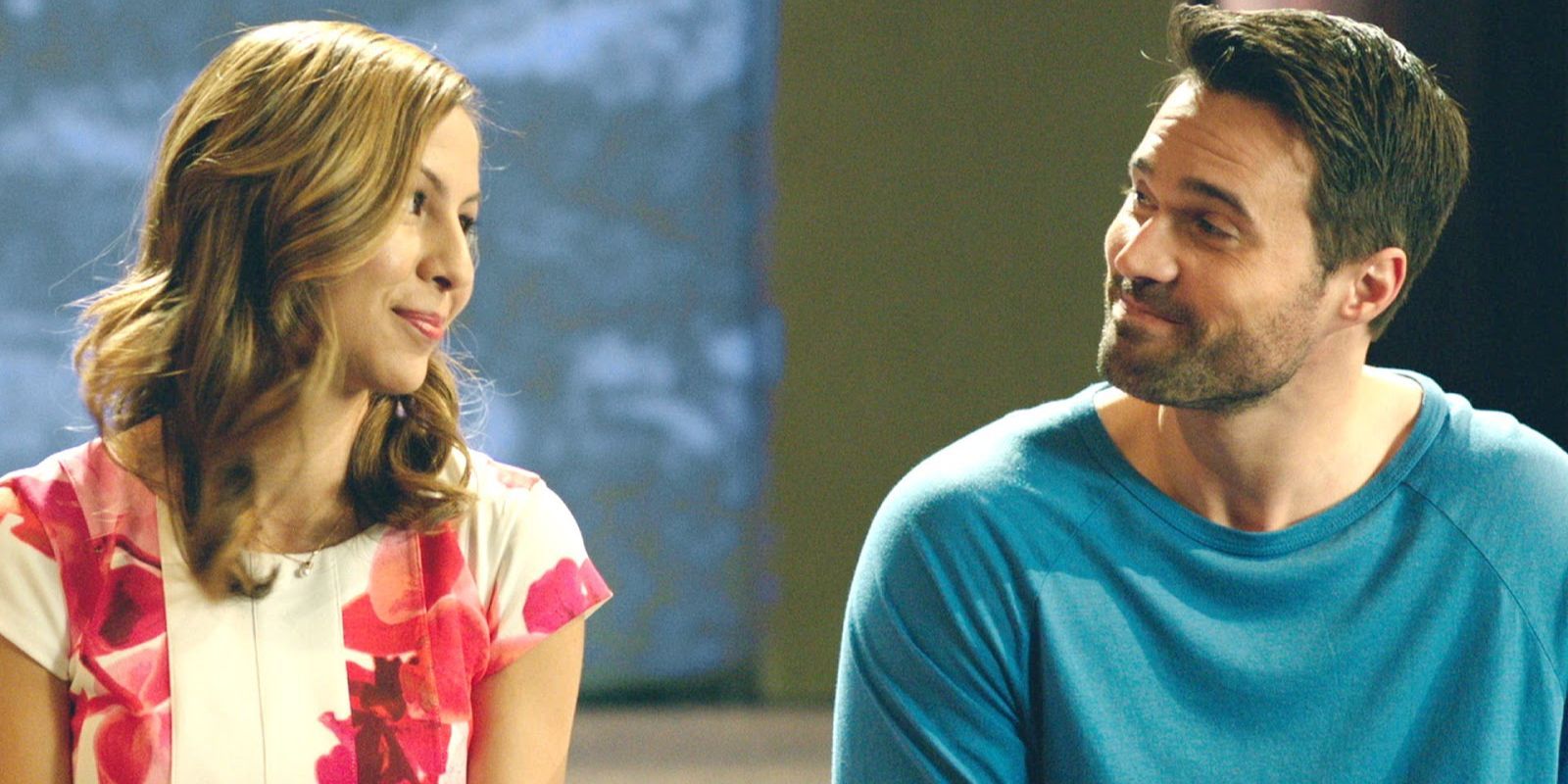 Gavin (Brett Dalton) &amp; Kelly (Anjelah Johnson-Reyes) look at each other in The Resurrection of Gavin Stone