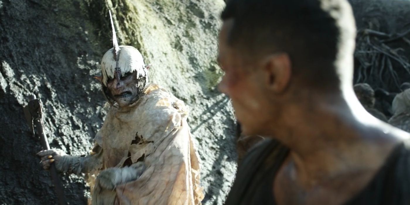 An orc and Arondir, played by Ismael Cruz Córdova, in 'The Rings of Power.'