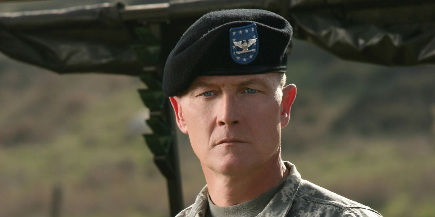 Robert Patrick wearing a black military beret in promotional image for The Unit