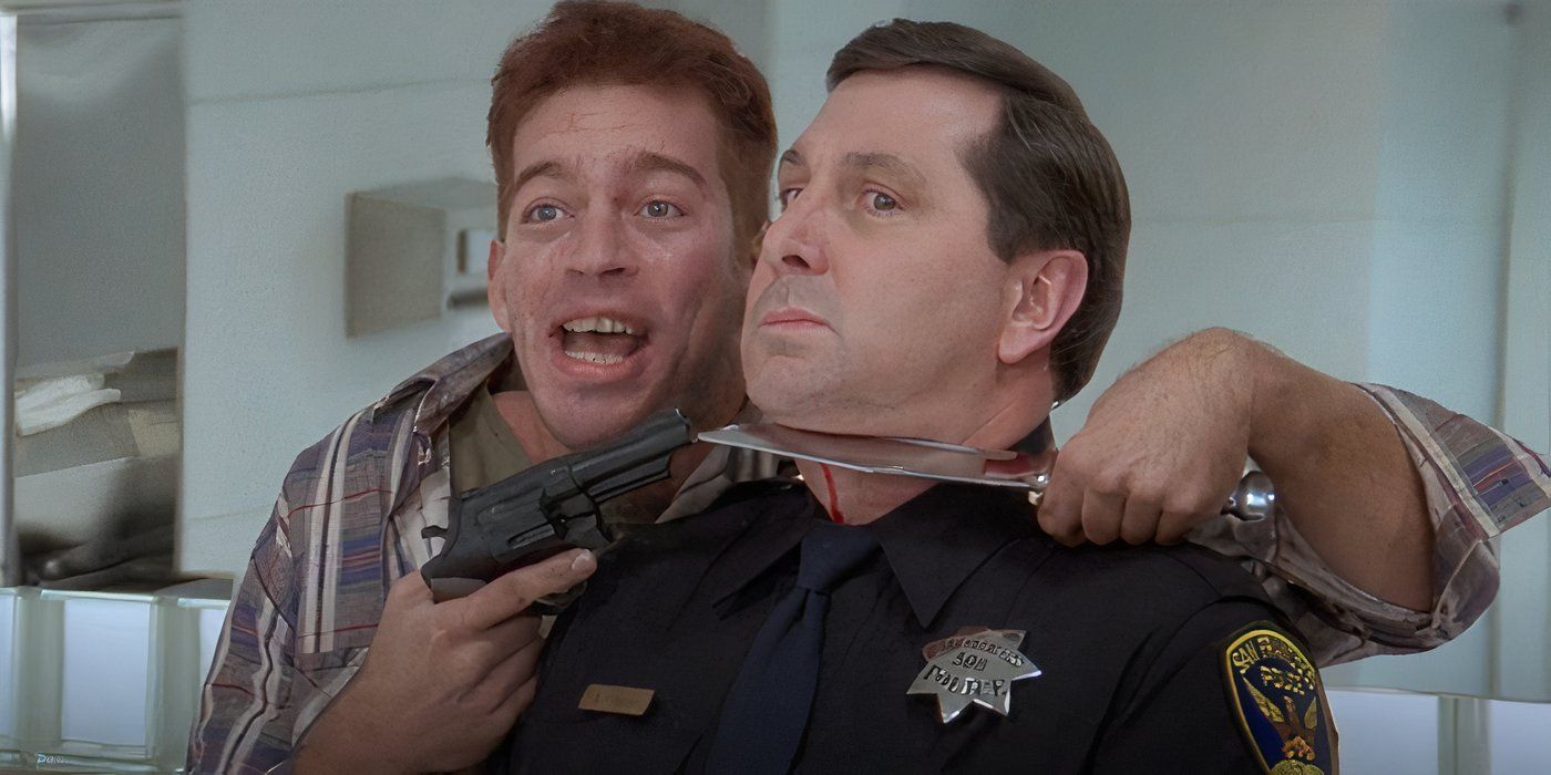 Daryll Lee Cullum (Harry Connick Jr.) holding a police officer at gun and knife point in Copycat (1995)