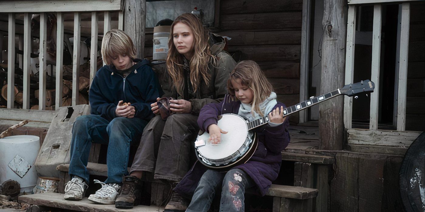 Jennifer Lawrence as Ree sitting on the steps of her house with her siblings in &lsquo;Winter&rsquo;s Bone&rsquo;