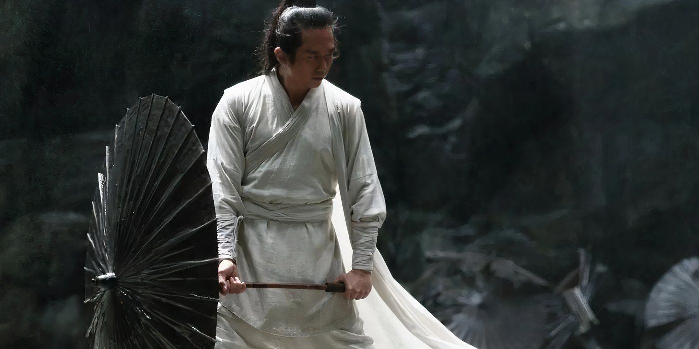 Ziyu, holding his signature parasol in 'Shadow'