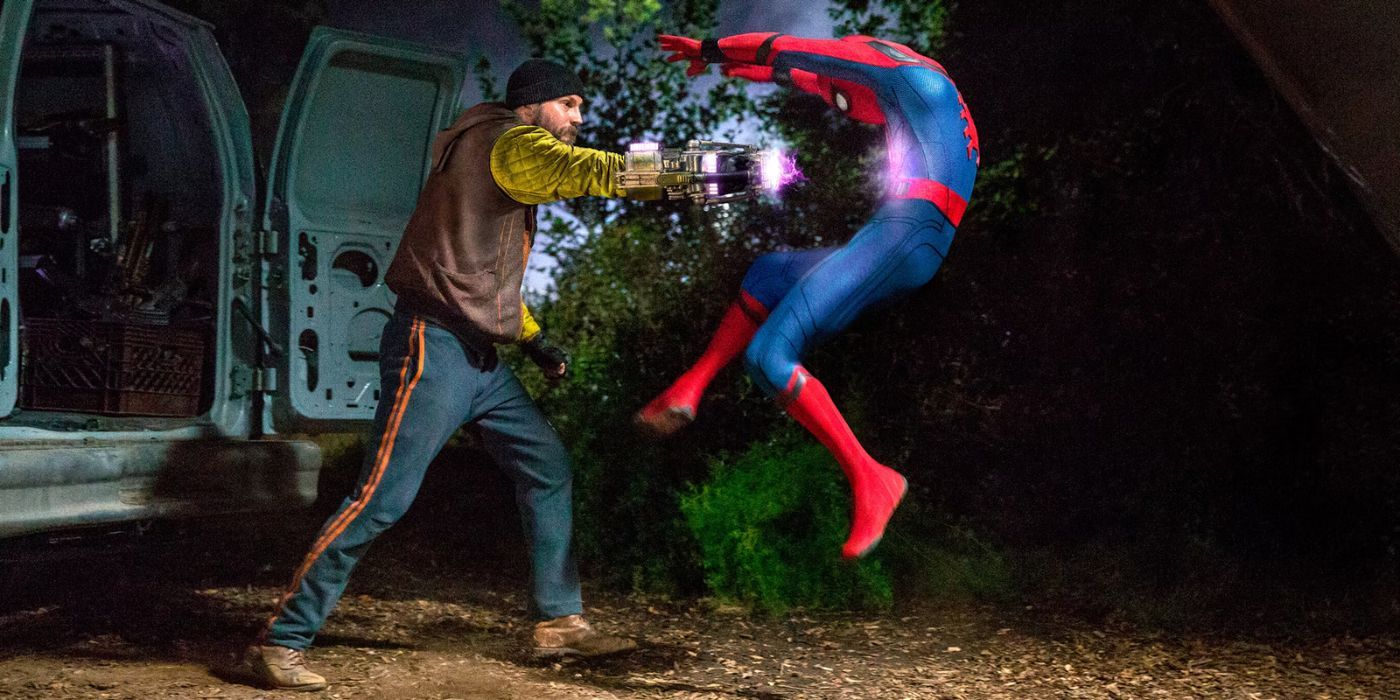 Shocker punching Spider-Man in the stomach in Spider-Man: Homecoming