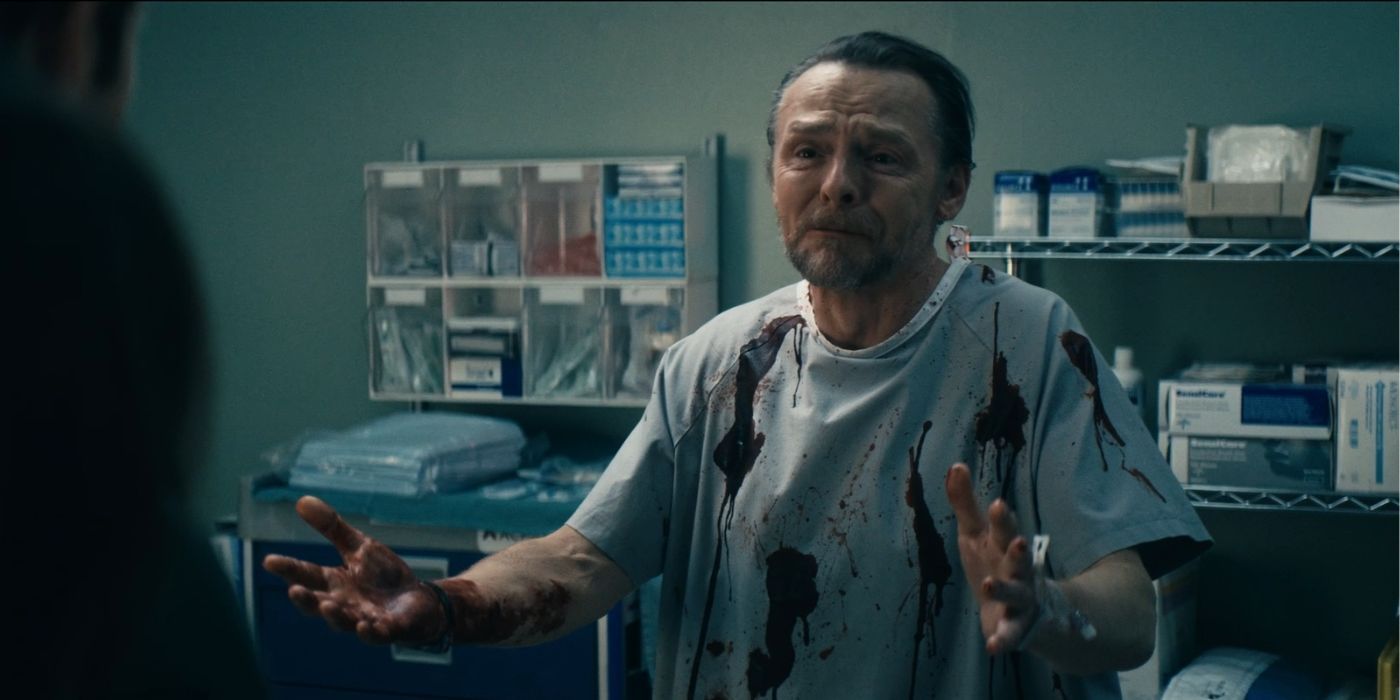 Simon Pegg as Hughie Sr. in a blood-soaked hospital gown in Episode 5 of Season 4 of The Boys