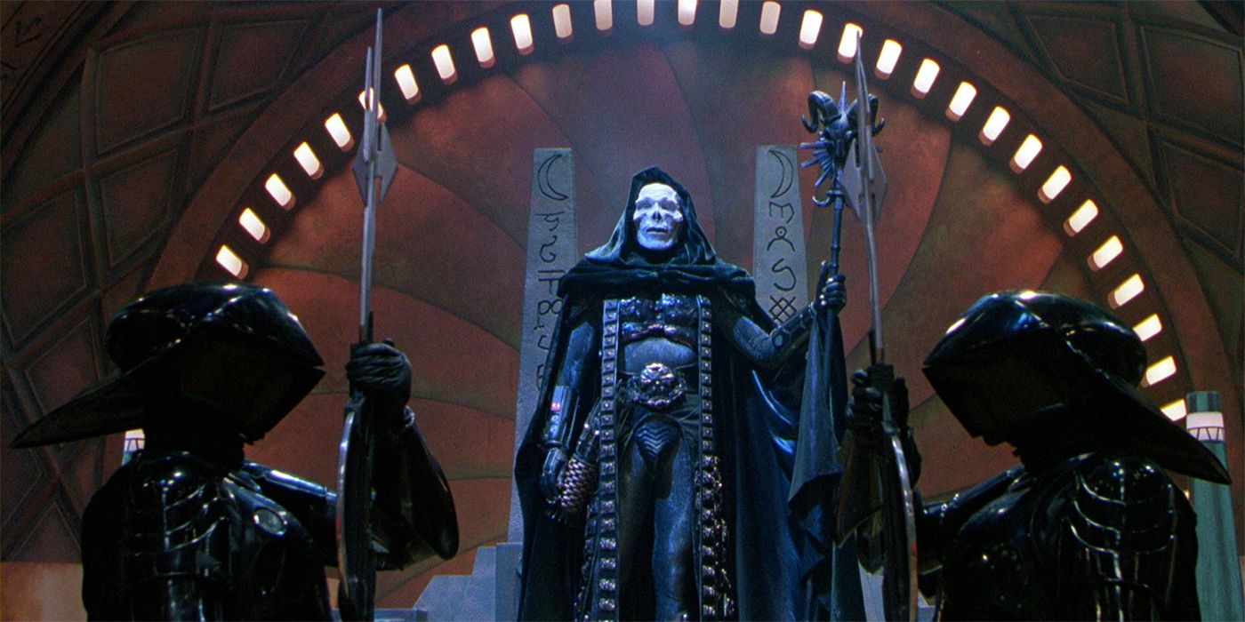 Skeletor (Frank Langella) stands tall before his throne as he holds his staff in &lsquo;Masters of the Universe&rsquo; (1987).