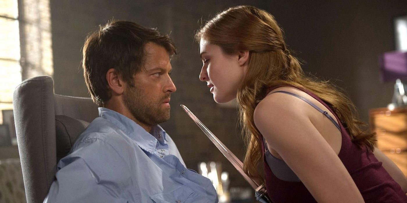 Castiel (Misha Collins) sits tied to a chair as a woman taunts him with an angel blade in &lsquo;Supernatural&rsquo; Season 9, Episode 3 &ldquo;I&rsquo;m No Angel&rdquo; (2013).