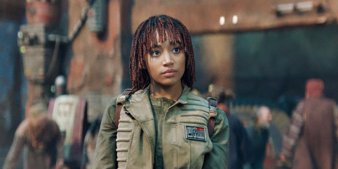 Amandla Stenberg as Osha standing on a street in The Acolyte Episode 2