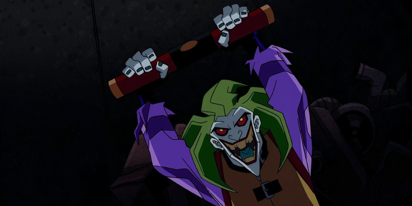 The Joker smiling evily as he raises his arms in 'The Batman'