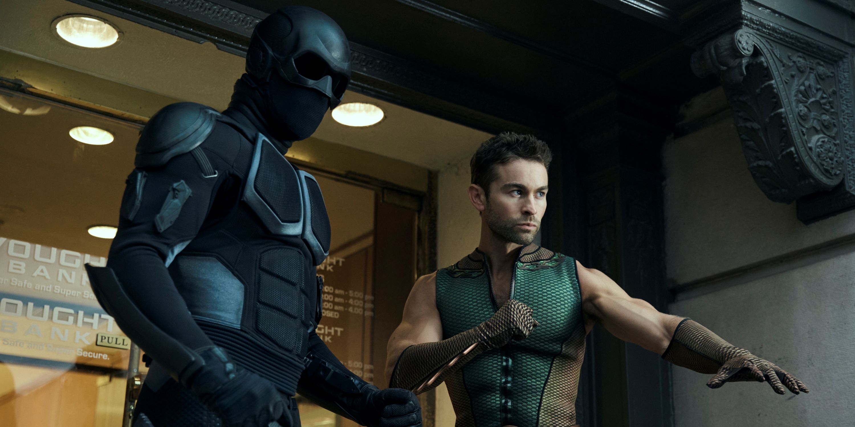 Chace Crawford as The Deep standing with Nathan Mitchell as Black Noir in Vought tower.
